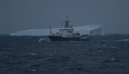Revelle and an iceburg, Kenneth Coale, MELVILLE Chief Scientist
