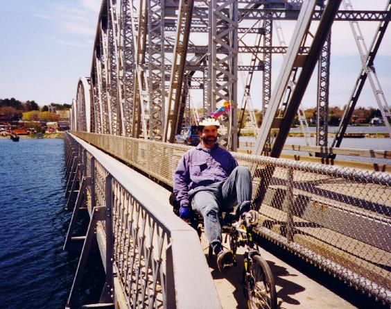KEVIN BICYCLING ACROSS THE BRIDGE IN STURGEON BAY, WI, MAY 1997.jpg 71.4K